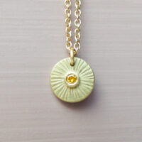 Orum-ethical-sun-pendant-with-a-yellow-diamond-and-fairtrade-gold-scaled