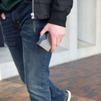 slim-leather-card-holder-in-mans-hand