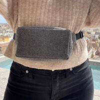 graphite-belt-bag-worn-with-sweater